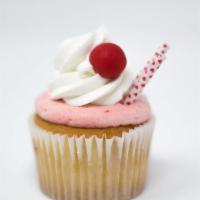Strawberry Milkshake Cupcake · Vanilla cupcake with strawberry whipped cream frosting, a dollop of buttercream, with red gu...