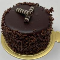 Chocolate Mousse · Layers of vanilla chiffon cake and chocolate mousse, dipped in chocolate ganache and chocola...