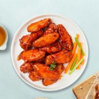 Hotzilla Wings · Deep-fried wings tossed in Frank's RedHot Sauce®, served with a side of ranch dressing.