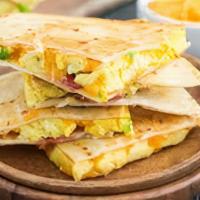 Breakfast Quesadilla · Delicious Quesadilla filled with eggs, meat, cheese and more.