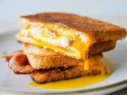 Breakfast Sandwich · Eggs, Meat and Cheese on Choice of Bread