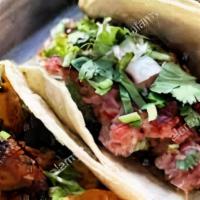 Tacos · Awesome Streat Tacos with your choice of meat.