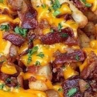Fries Loaded · Fries smoothered in cheese, meat and all your favorite toppings.
