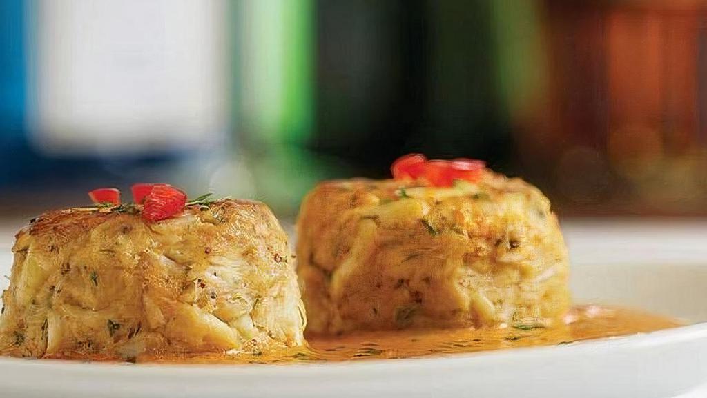 Crab Cakes · Roasted red pepper and lime butter sauce.
