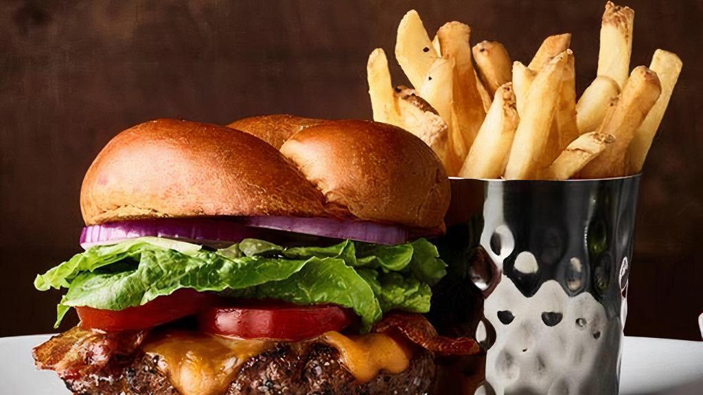 The Prime Burger · Our steakhouse burger, Wisconsin cheddar cheese, peppered bacon, side of french fries & ketchup