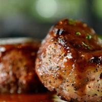 Bacon Wrapped Filet Mignon Medallions · Twin 4 oz medallions, peppercorn sauce.