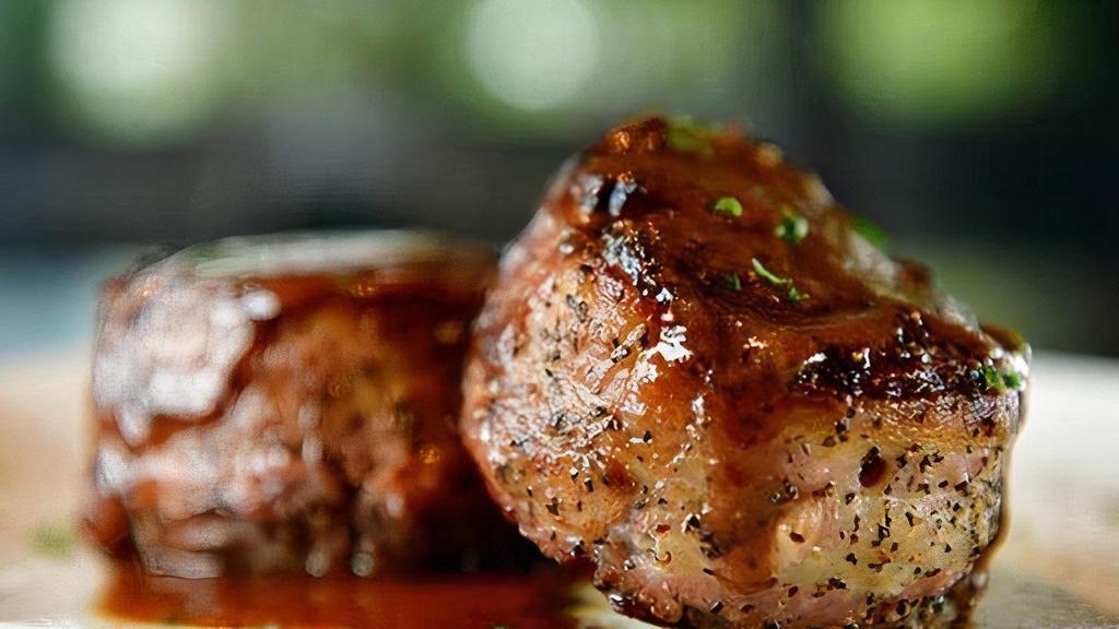 Bacon Wrapped Filet Mignon Medallions · Twin 4 oz medallions, peppercorn sauce.