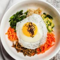 Bibimbap · Warm rice topped with sautéed vegetables, Egg, and Bulgogi Beef. 
Substitute for Spicy Pork,...
