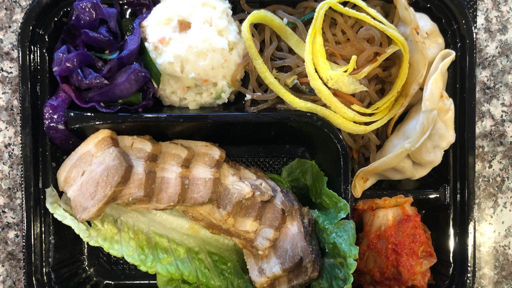 BOSSAM BOX · SPICED AND SLICED PORK BELLY, Potato Mash, Cabbage, Sweet Potato Noodles, Kim and Rice all packed in a Box!