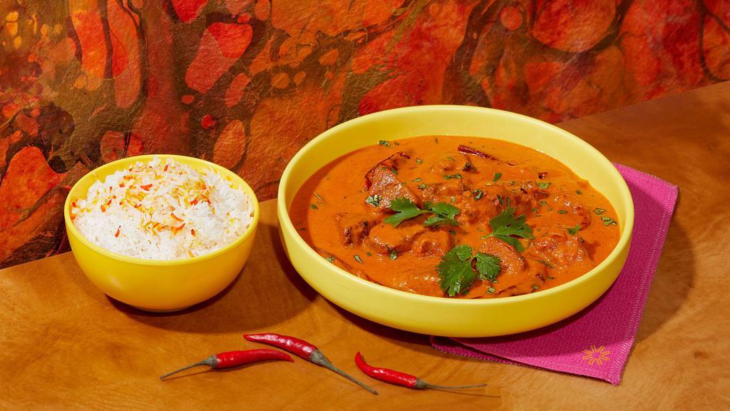 Lamb Tikka Masala · Spicy lamb in a creamy tomato sauce. Includes side of Rice.
