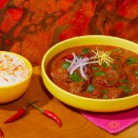 Lamb Curry · Spicy lamb in a creamy curry sauce. Includes side of Rice.