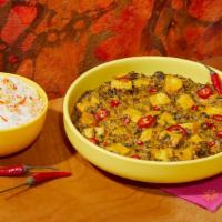Saag Paneer · Paneer cheese in a spicy spinach and curry sauce. Includes side of Rice.