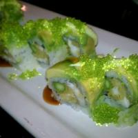 Green Monster(Standard) · Tempura snapper & asparagus, topped with avocado, wasabi tobiko, teriyaki sauce & cilantro s...