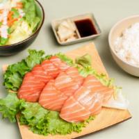 Salmon Sashimi (12 pcs) · fresh and sliced raw salmon (12 pcs).