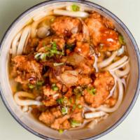Spicy Udon · Fried Chicken Karaage, Fried Onion and tofu with spicy miso base. (spicy levels: 1. mild spi...