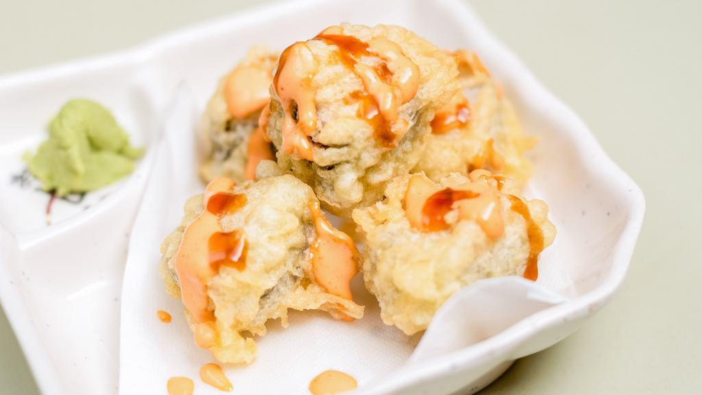 Fire Crackers · Salmon and Albacore sushi Tempura Ball with spicy sauce.
(5 balls)