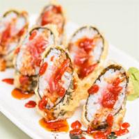 Dynamite Roll · light batter-dipped fried Spicy Tuna and topped with Spicy Hot sauce.