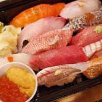 Omakase nigiri 12 piece · Chef’s choice nigiri from daily special fish