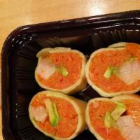 Naruto · Spicy tuna, Hamachi, Sake, Avocado, Wrapped in cucumber sheet with garlic ponzu