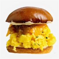 Veggie Egg and Cheese Breakfast Sandwich · Egg, cheese, caramelized onions, tomato and aioli.