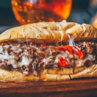The Champ · Mushrooms, roasted red bell peppers, Provolone. Our steaks are custom made, straight outta P...