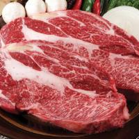 Prime Ribeye | 꽃등심 · Comes with steamed rice and different side dishes.
