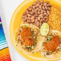 Taco Plate · 2 regular tacos, rice, beans.