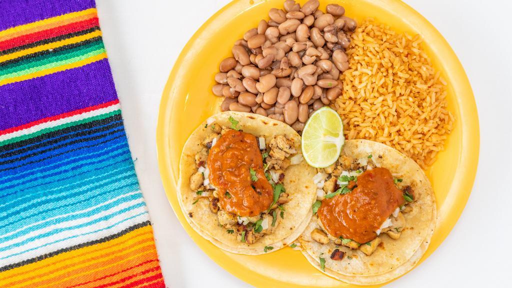 Taco Plate · 2 regular tacos, rice, beans.