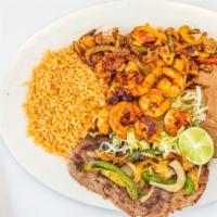 Gran Amigo Plate · whole steak, diabla shrimp, chicken fajitas, grilled jalapeños and onions, rice, beans, tort...