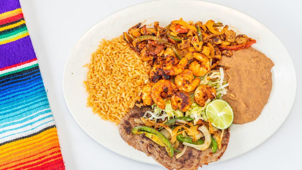 Gran Amigo Plate · whole steak, diabla shrimp, chicken fajitas, grilled jalapeños and onions, rice, beans, tortillas.