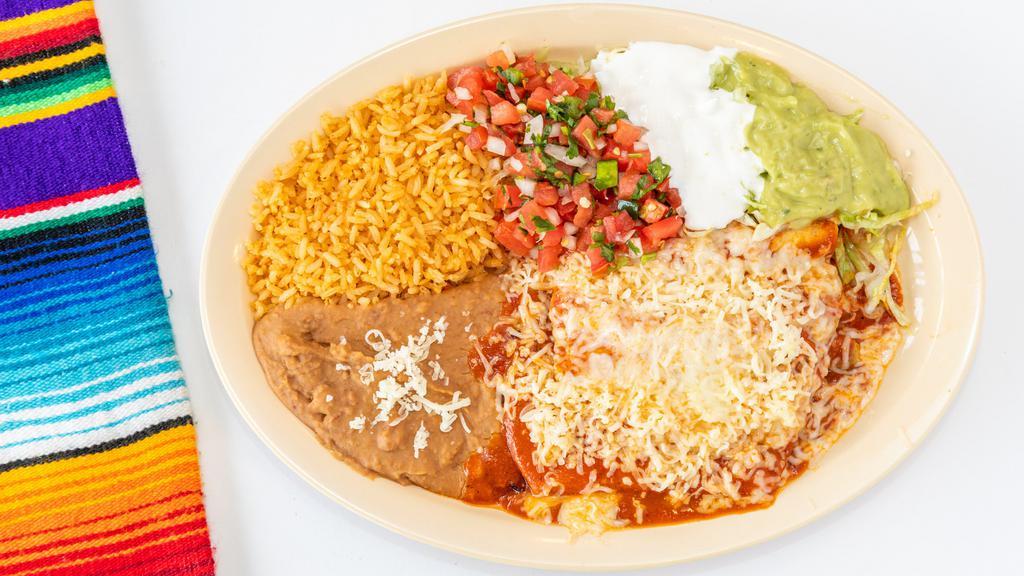 Enchiladas · choice of meat. Add shrimp for an additional charge.