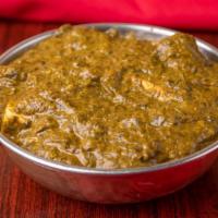 Palak Paneer · Chopped creamy spinach cooked with homemade cheese and herbs.