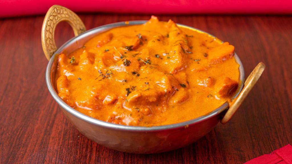 Butter Chicken · Chicken in creamy sauce cooked with Indian herbs.