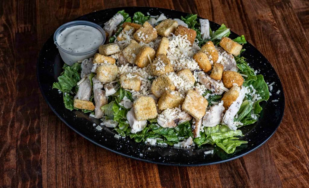 Caesar · Fresh crisp romaine, a generous portion of shredded parmesan cheese, and seasoned croutons to top it off(800 cal)
