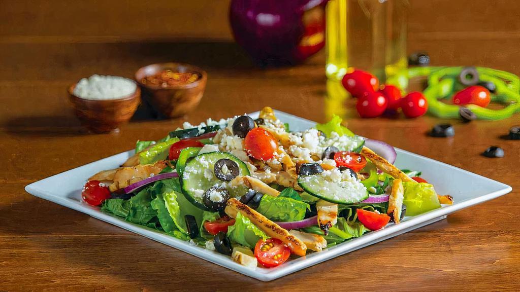 Greek With Chicken · Chicken, fresh crisp romaine, authentic Feta cheese, tomatoes, green peppers, red onions, black olives, and fresh cucumbers make this salad as good as it looks. 82- cal.