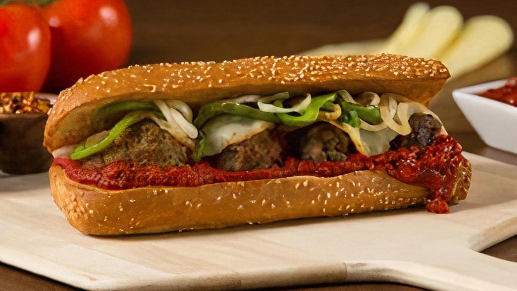 Meatball Sandwich · Our hand-rolled meatballs smothered with our original meat sauce, onions, green peppers, and melted provolone cheese baked to perfection. 950 cal.