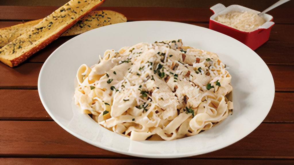 Fettuccine Alfredo With Chicken · Fettuccine pasta served with hot, creamy Alfredo sauce topped with 100% Mozzarella cheese and chicken. 1850 cal.