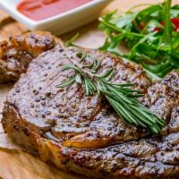 Ribeye Steak · Grilled Ribeye Steak Marinated with Garlic, Rosemary, Sage, Olive Oil, Salt Pepper served wi...