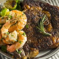 Shrimp & Ribeye · Juicy Ribeye Steak rich in flavor alongside with Flavorful Shrimp. Comes with creamy Mashed ...