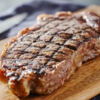New York Steak · Juicy, tender New York Steak loaded with flavor. Comes with a side of creamy mashed potatoes...
