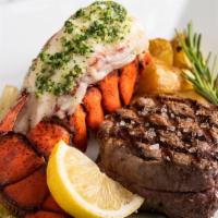 Filet Mignon & Lobster · Tasty and oh so Tender Filet Mignon that just melts in your mouth, aired with a Tender and B...