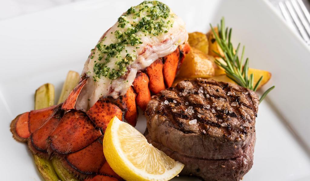 Filet Mignon & Lobster · Tasty and oh so Tender Filet Mignon that just melts in your mouth, aired with a Tender and Buttery Lobster Tail. Comes with a side of creamy mashed potatoes and vegetables