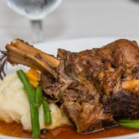 Lamb Shank · Flavorful tender Lamb Leg cooked to perfection. Comes with a side of creamy mashed potatoes ...
