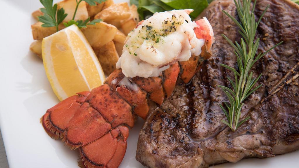 New York Steak & Lobster · Juicy, tender New York Steak loaded with flavor, partnered with a tender and buttery Lobster Tail. Comes with a side of creamy mashed potatoes and vegetables