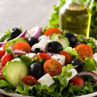 Greek Salad · Spring Mixed Black Olives, Cherry Tomatoes, Feta Cheese, Red Onions, Cucumber, Lemon Vinegar