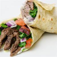 Beef Shawarma Plate · Juicy, thinly sliced, spit-roasted beef shawarma seasoned to perfection. Served with creamy ...