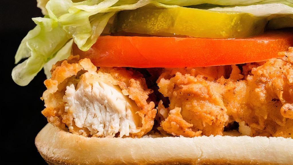 Chicken Sandwich Combo · Fries and Can Soda.  Fried chicken, lettuce, pickle, tomato and honey mustard.