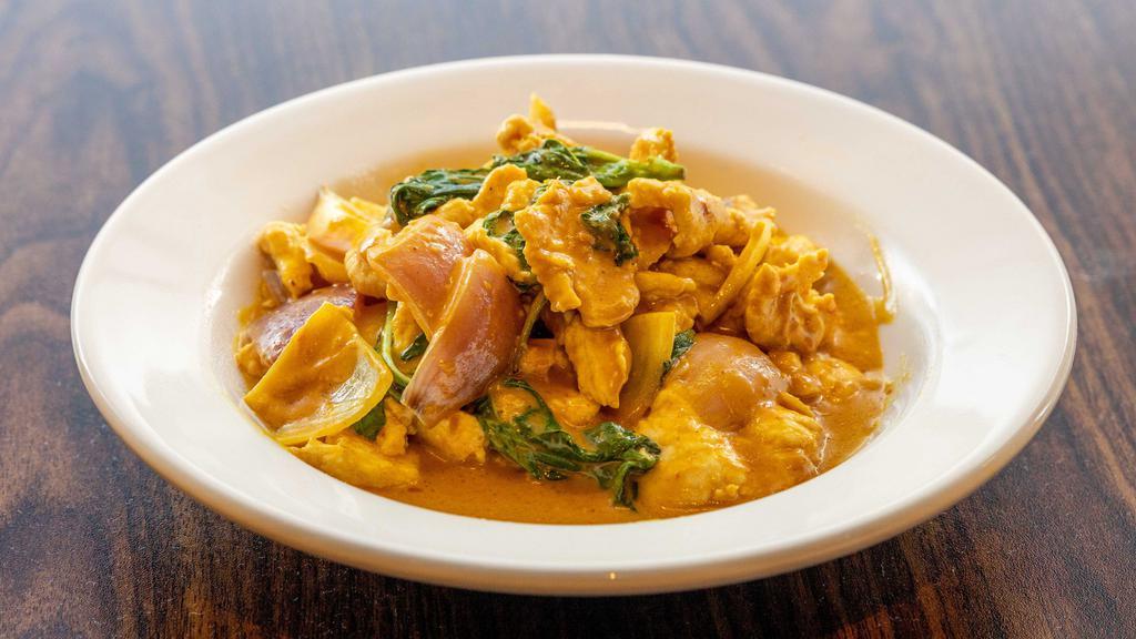 Curry Chicken · Tender chicken breast nuggets with onions in curry coconut sauce.