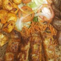 #14 Kabab family combo · Family combo 5-6 people, 11 skewer mix kebab: Four chicken tikka, three chicken kofta, two l...