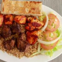 #7 · this platter is served with one lamb tikka (Lamb legs cut into cubs and marinated in our own...